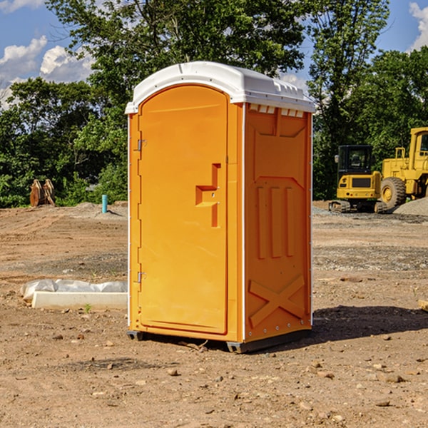 how often are the portable restrooms cleaned and serviced during a rental period in Harrison